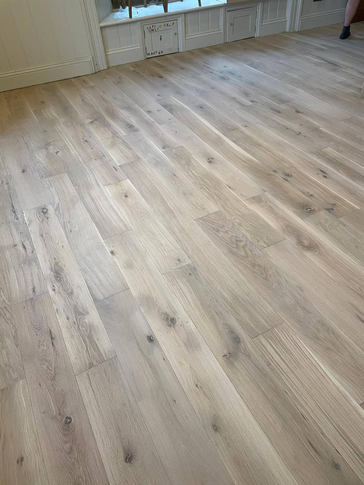 "Solid wood floor fitting service in Gloucestershire home"